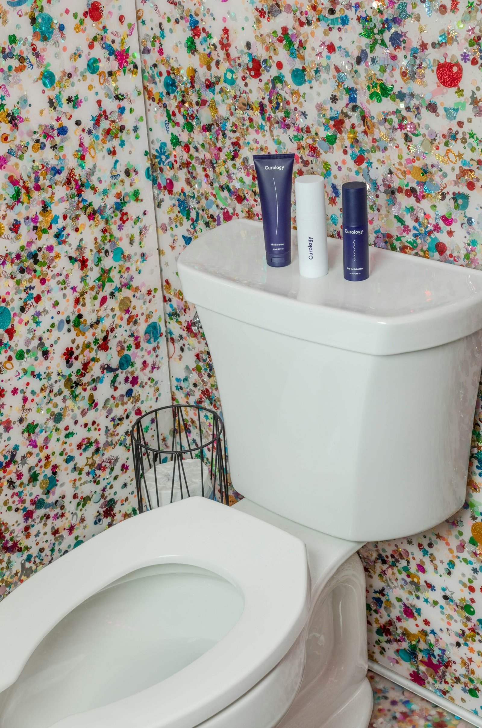 white toilet bowl with cistern